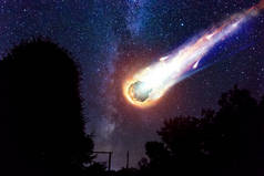 一颗彗星、一颗小行星、一颗陨石在星空上坠落地面。陨石的攻击。流星雨。卡梅塔尾巴世界末日。阿斯罗米里.