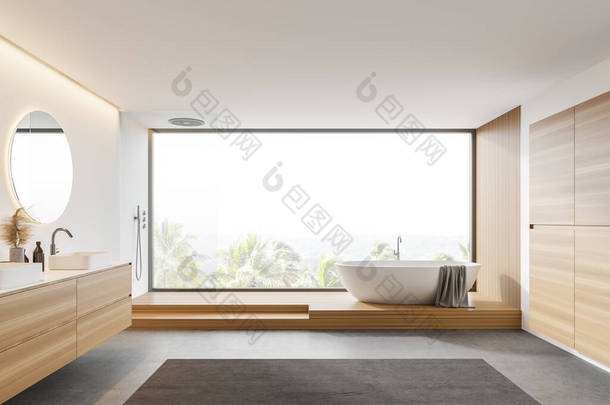 现代全景浴室的内部有白色和木制墙壁，混凝土地面，舒适的浴缸，淋浴间和带有圆形镜子的双水池。乌黑的热带景色.3d渲染