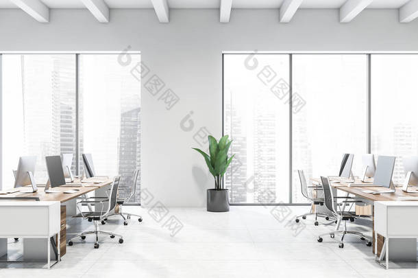 现代白色开放空间办公室的侧视图
