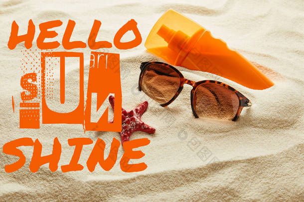 棕色时尚太阳镜和防晒霜在橙色瓶上与你好阳光字母