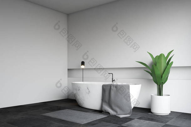 现代化<strong>浴室</strong>的角落有白色的墙壁, 黑色瓷砖地板和白色大理石<strong>浴缸</strong>, 上面挂着毛巾。3d 渲染