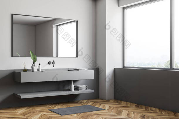 时尚浴室的角落, 有白色和灰色的墙壁, 木地板, 大窗户和长灰色水槽与水平镜子挂在上面。3d 渲染