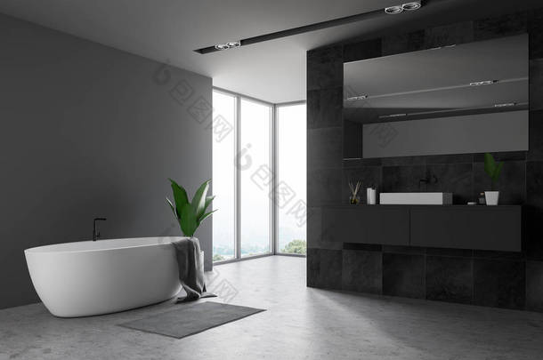 阁楼浴室的角落, 灰色和黑色瓷砖墙, <strong>水泥</strong>地板, 大窗户, 浴缸与灰色毛巾在它和白色水槽站在灰色的台面上。3d 渲染