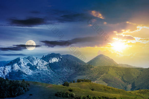 白天和晚上的时间改变概念在山之上与岩石形成。草地草甸, 森林丘<strong>陵</strong>和巨大的悬崖。美妙的自然风光。春天与太阳和月亮的美丽天气