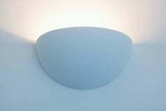 Semi-circular wall uplighter with glowing light beam