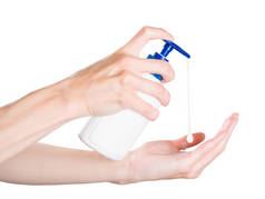 女用手用肥皂滴推着肥皂分配器.被隔离在白色的快捷方式上，包括