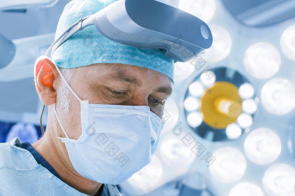在高科技医院，一名有增强型真空镜的外科医生的特写镜头表演了最先进的外科技术。在手术室工作的医生和助理.