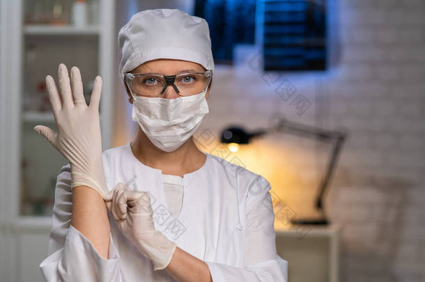试管背景的实验室<strong>女博士</strong>及面具和玻璃器皿中的医疗设备