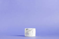 Empty white marble podium on pantone 2022 blue color background. Minimal boxes and geometric podium.