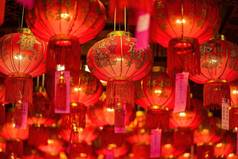 Bangkok, Thailand - December, 20, 2021 : Red Lanterns with chinese text mean Good Luck in Wat Leng N