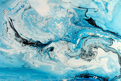蓝色的大理石纹理。创作背景与抽象油绘波，手工制作的表面。液体涂料.