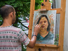亚洲女人，油色在画布上的艺术家画肖像