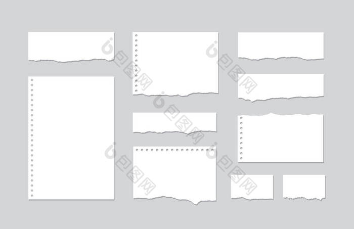 将撕破的白色内衬笔记本纸片设置在灰色背景上