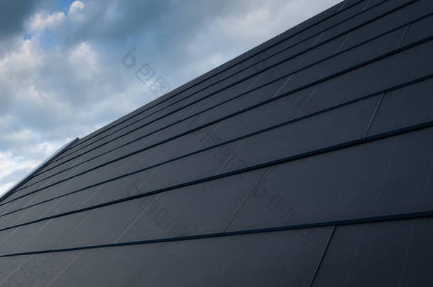 黑色太阳能屋顶的概念。 由现代单晶黑色太阳能屋顶瓦组成的建筑集成光伏系统。 3d渲染.