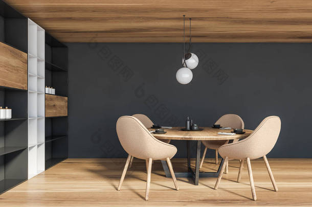 有灰色墙壁、木制地板和天花板的现代餐厅的内部，有米色椅子的<strong>圆桌</strong>和有碗碟的橱柜。3d渲染