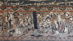 莫高窟岩石中的壁画残余物- -悬崖外墙，刻在当地的砂岩上，描绘了公元4世纪至14世纪的佛教图像。敦煌-甘肃-中国.