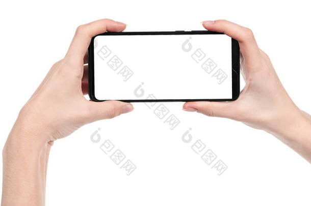 女人的手拿着黑色的新智能手机与空白屏幕隔离的白色背景。使用电话<strong>快捷</strong>方式的手