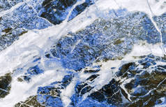 蓝色石英石，有白色和黑色条纹。天然石英背景和质地.