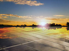 日落背景下的太阳能电池屋顶，可持续能源概念.