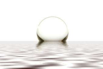 水晶球不断上升的出平静水与光彩色的背景水晶球