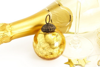 金古董圣诞节球与底香槟玻璃而且香槟瓶金古董圣诞节球与底香槟玻璃而且香槟瓶白色