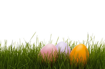 三个柔和的复活节鸡蛋草三个柔和的复活节鸡蛋草与白色背景