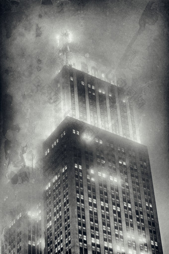 新纽约城市12月的帝国状态建筑笼罩雾晚上的城市吸引了几百万人<strong>每年</strong>