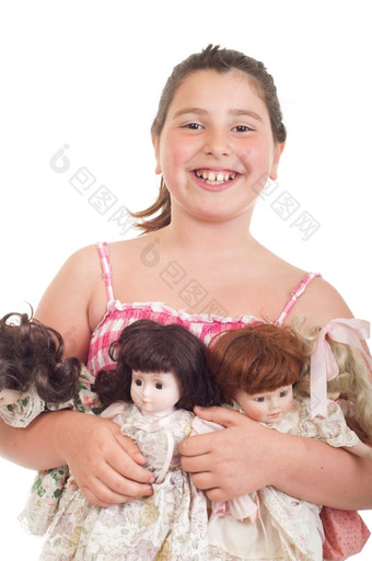快乐的小女孩与她的最喜欢的娃娃孤立的白色背景
