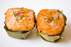 美味的泰国食物调用HORMOK从鱼而且辣的咖喱成分与热蒸汽