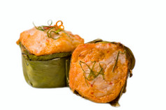 美味的泰国食物调用HORMOK从鱼和辣的咖喱成分与热蒸汽白色背景泰国厨房食物调用HORMOK