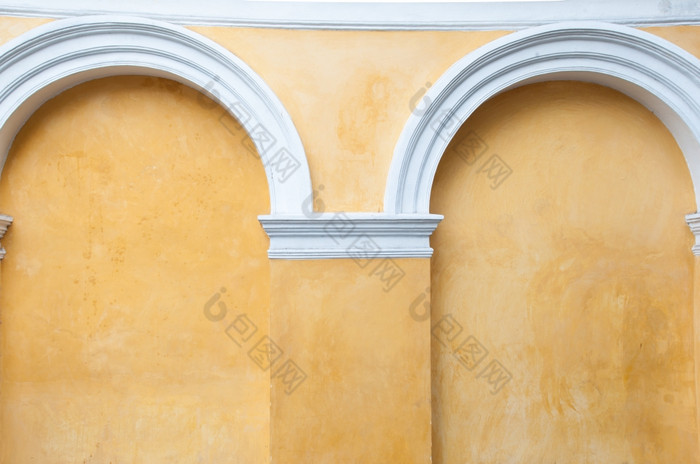 墙拱门角落的门的墙是画经典棕色（的）