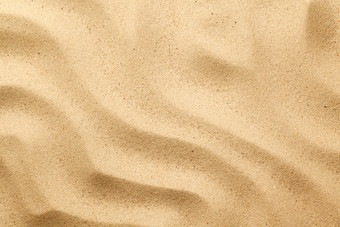 自然海沙子为夏天背景前视图平躺