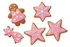 圣诞节姜饼饼干与粉红色的糖衣孤立的白色背景前视图