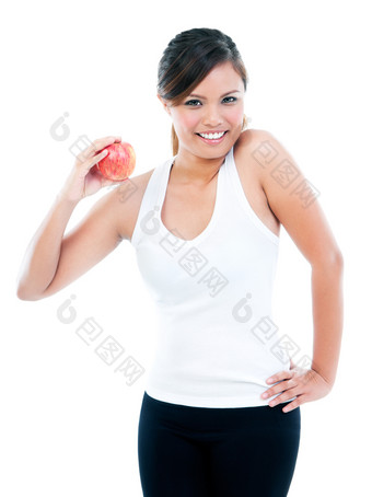 肖像年轻的健身女人摆姿势和<strong>展示苹果</strong>对白色背景