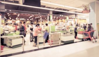 超市商店模糊背景收银员计数器与客户古董过滤器效果图像