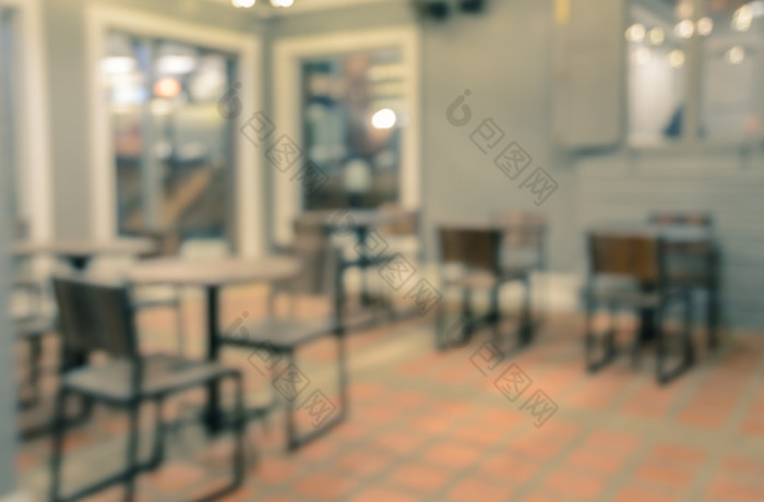 摘要模糊咖啡商店餐厅为背景复古的过滤后的效果图像
