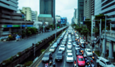 模糊图像交通小时冲小时汽车曼谷业务区域市中心真正的生活运输概念