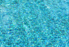 模糊背景蓝色的波及模式水游泳池