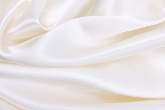 光滑的优雅的白色丝绸缎奢侈品布纹理可以使用<strong>婚礼背景</strong>豪华的背景设计