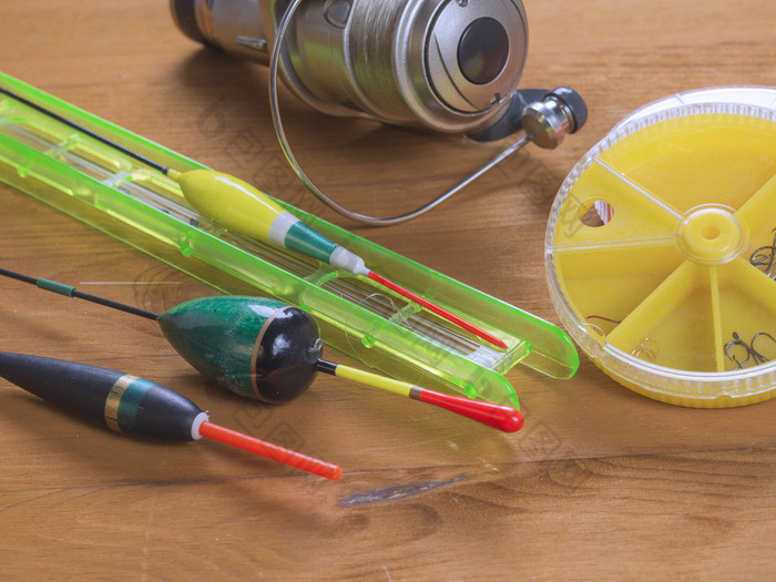 旋转卷钓鱼行与浮动和轮盒子为钩子解决为夏天钓鱼浮点数轮黄色的盒子鱼钩子