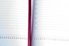 特写镜头的开放日记开放日记与红色的书签特写镜头
