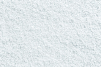雪纹理背景自然白色闪闪发光的纯雪纹理背景