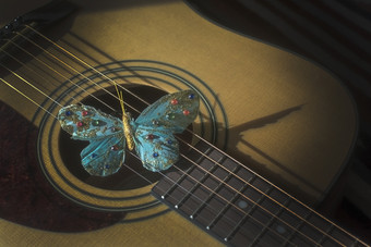 绿松石蝴蝶字符串声吉他概念为<strong>诗歌</strong>乐感歌手作曲家创造力绿松石蝴蝶字符串声吉他