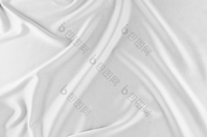 光滑的优雅的白色丝绸缎奢侈品布可以使用婚礼背景豪华的圣诞节背景新一年背景设计白色织物纹理布纺织表面前视图光滑的白色丝绸缎纹理