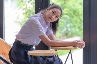 年轻的亚洲大学<strong>学生</strong>统一的美丽的女孩放松和微笑咖啡商店为学习在线休闲业务社会会议<strong>教育</strong>概念<strong>教育</strong>概念
