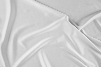 光滑的优雅的白色丝<strong>绸缎</strong>奢侈品布可以使用婚礼背景豪华的圣诞节背景新一年背景设计白色织物纹理布纺织表面前视图光滑的白色丝<strong>绸缎</strong>纹理