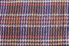 色彩斑斓的棉花织物与手编织背景细节