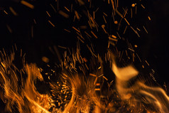 火火焰黑色的背景大火火火焰纹理背景关闭火火焰孤立的黑色的背景燃烧摘要火火焰背景纹理