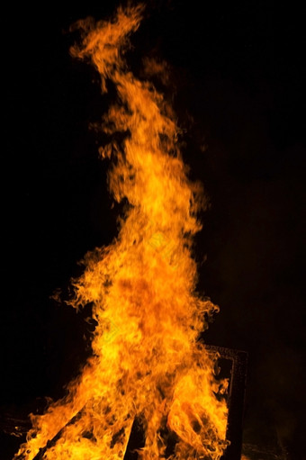 火火焰黑色的背景大火火火焰纹理背景关闭火火焰孤立的黑色的背景