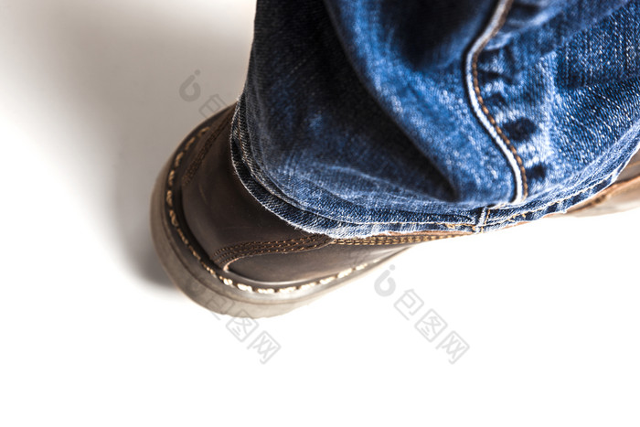 但rsquo棕色（的）靴子和蓝色的牛仔裤孤立的白色Bacground但rsquo棕色（的）靴子和蓝色的牛仔裤孤立的